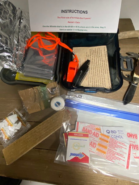 First Aid kit aslo shown on this page Survival Kit